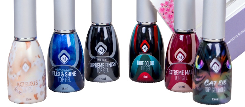 Diverse flesjes top gel van het merk Magnetic uit het assortiment van Nail Academy Nicolle